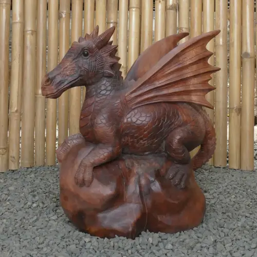 Product image of the product “Dragon with leg lifted on the right made from suar wood, about 50cm Height ”